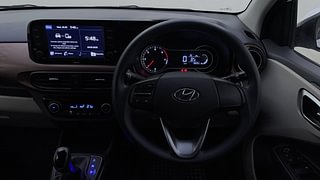 Used 2022 Hyundai Aura SX Plus 1.2 AMT CRDI Diesel Automatic interior STEERING VIEW
