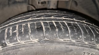 Used 2024 Tata Tigor Revotron XZA plus AMT Petrol Automatic tyres LEFT FRONT TYRE TREAD VIEW