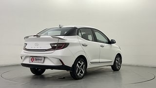Used 2023 Hyundai Aura SX 1.2 CNG Petrol+cng Manual exterior RIGHT REAR CORNER VIEW