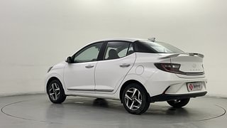 Used 2023 Hyundai Aura SX 1.2 CNG Petrol+cng Manual exterior LEFT REAR CORNER VIEW