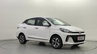Used 2023 Hyundai Aura SX 1.2 CNG Petrol+cng Manual exterior RIGHT FRONT CORNER VIEW