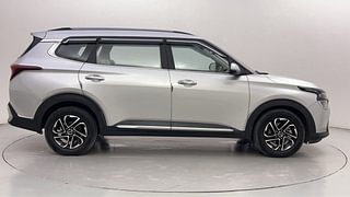 Used 2023 Kia Carens Luxury 1.5 Diesel iMT 7 STR Diesel Manual exterior RIGHT SIDE VIEW