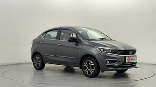 Used 2023 Tata Tigor Revotron XZ+ CNG Petrol+cng Manual exterior RIGHT FRONT CORNER VIEW