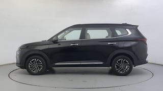 Used 2022 Kia Carens Luxury Plus 1.5 Diesel AT 7 STR Diesel Automatic exterior LEFT SIDE VIEW