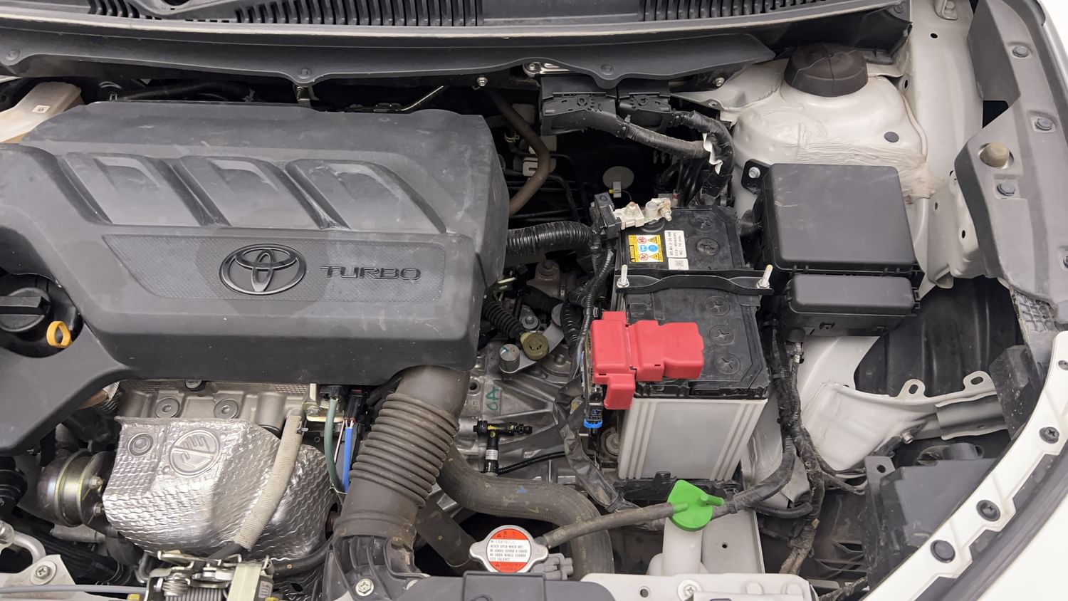 New Toyota Urban Cruiser Taisor engine ENGINE LEFT SIDE VIEW