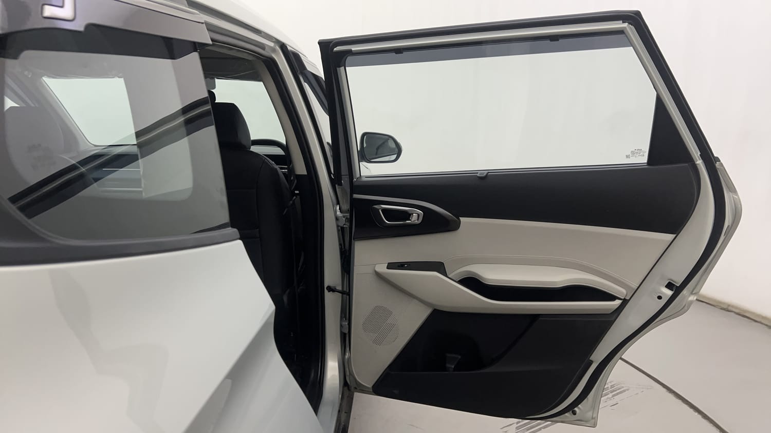 New Kia Carens Clavis interior RIGHT REAR DOOR OPEN VIEW