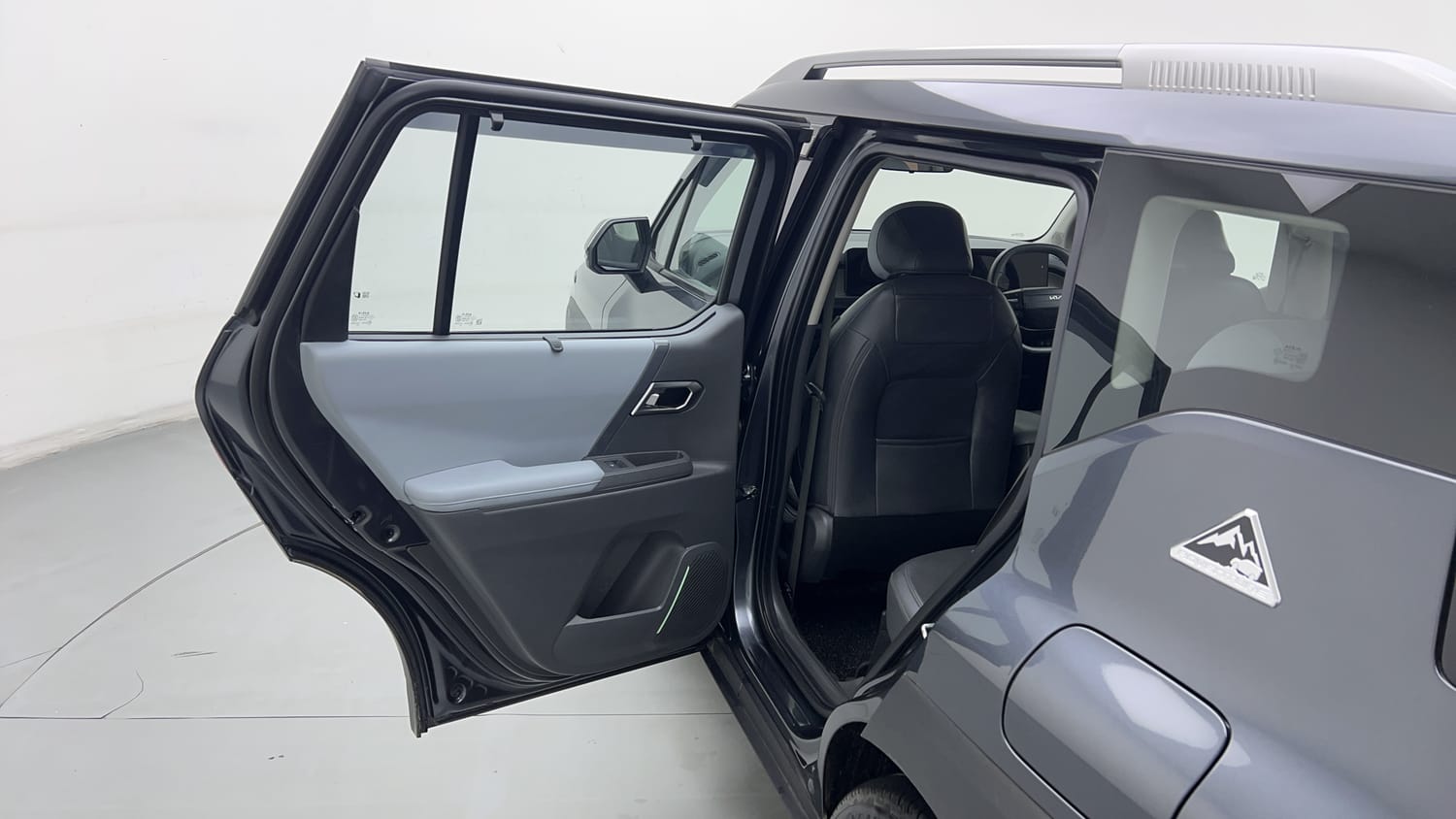 New Kia Syros interior LEFT REAR DOOR OPEN VIEW