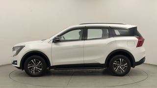 Used 2024 Mahindra XUV700 AX 3 Petrol AT 5 STR Petrol Automatic exterior LEFT SIDE VIEW