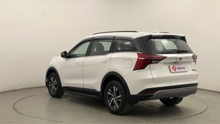 Used 2024 Mahindra XUV700 AX 3 Petrol AT 5 STR Petrol Automatic exterior LEFT REAR CORNER VIEW