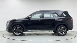Used 2023 Hyundai Alcazar Platinum 7 STR 1.5 Diesel Diesel Manual exterior LEFT SIDE VIEW