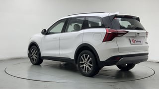 Used 2024 Mahindra XUV700 AX 7 Petrol AT 7 STR Petrol Automatic exterior LEFT REAR CORNER VIEW