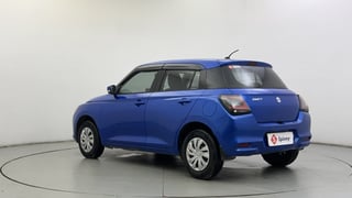 Used 2024 Maruti Suzuki Swift VXi (O) Petrol Manual exterior LEFT REAR CORNER VIEW