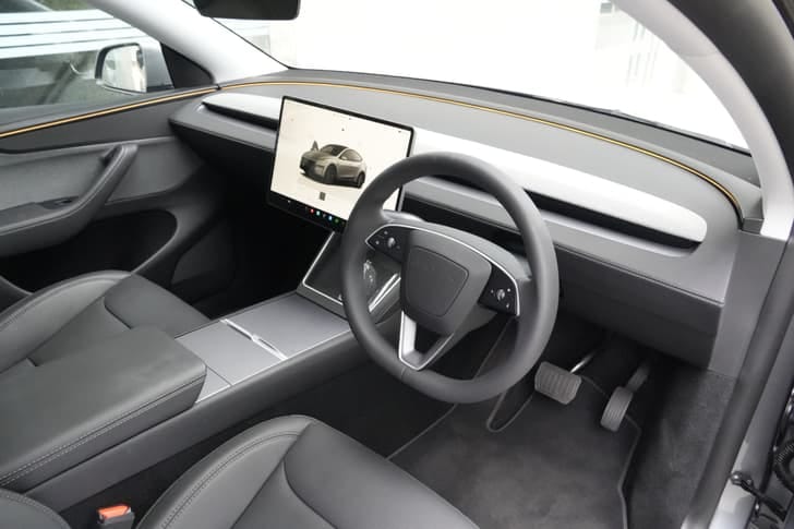 New Tesla Model Y interior STEERING VIEW