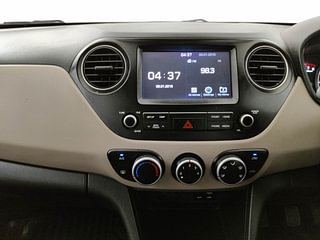 Used 2019 Hyundai Grand i10 Sportz 1.2 Kappa VTVT Petrol Manual interior MUSIC SYSTEM & AC CONTROL VIEW