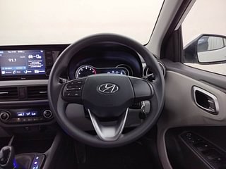 Used 2022 Hyundai Grand i10 Nios Sportz AMT 1.2 Kappa VTVT Petrol Automatic interior STEERING VIEW